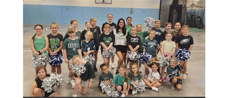 Gator cheer got to meet Lauren from the Eagles Cheer Squad today!! 